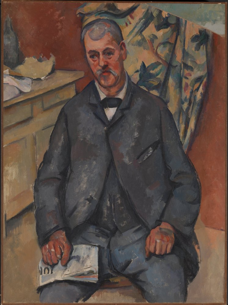 Uomo Seduto
