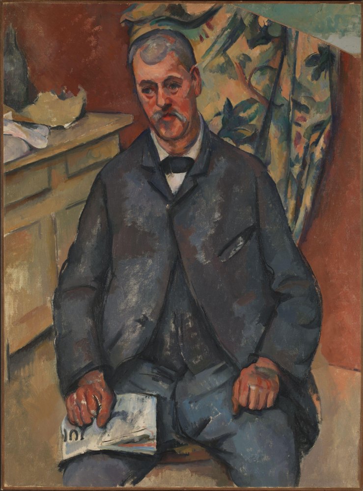 Uomo Seduto