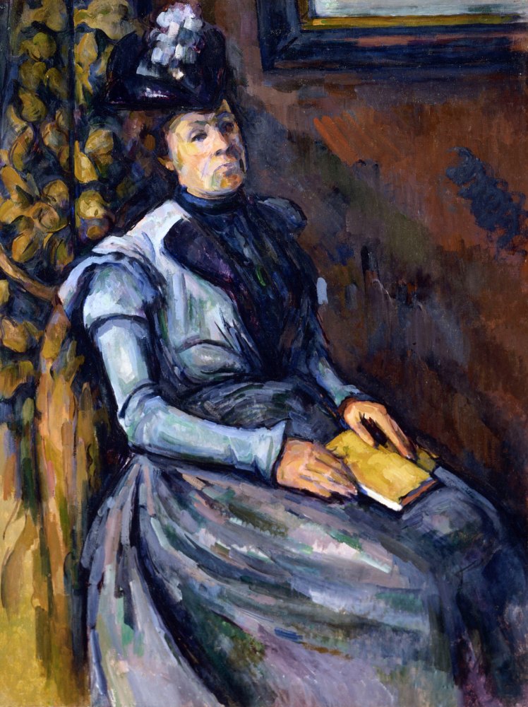 Donna Seduta in Blu